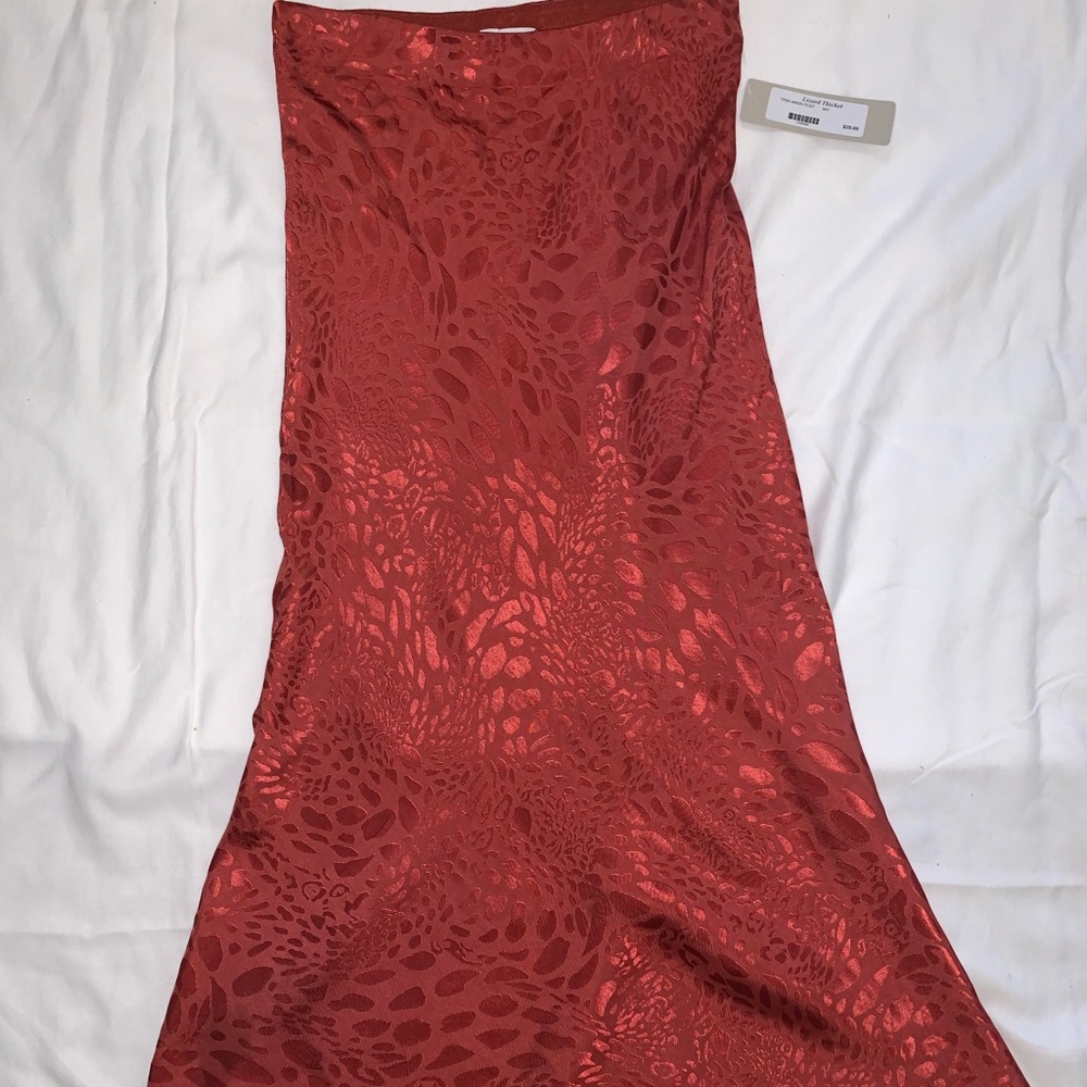 deep orange patterned midi skirt